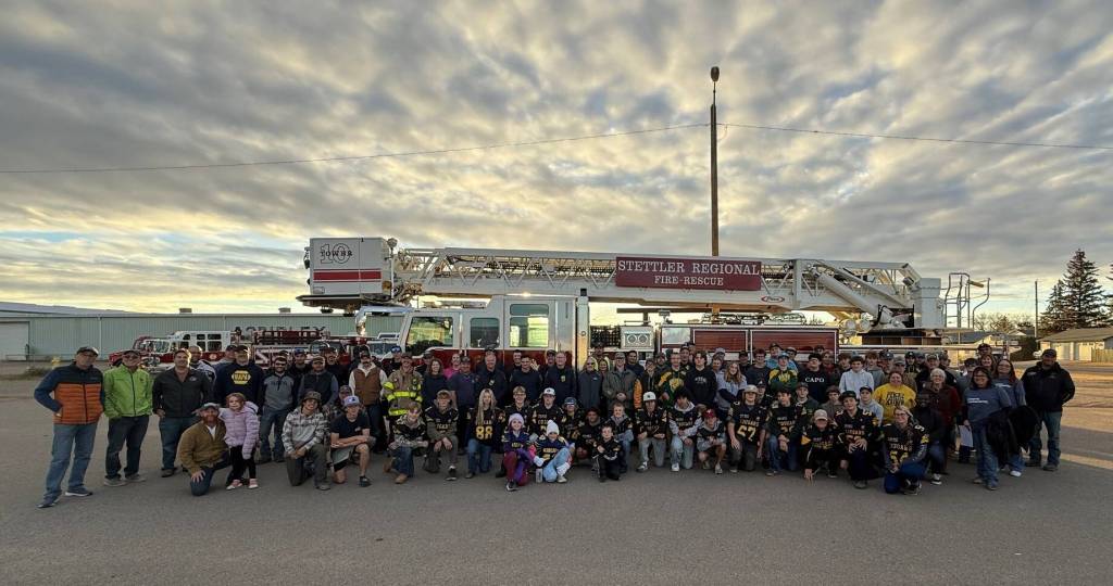 Volunteers gather for a group photo after the annual Stettler food drive on Oct. 6. (Facebook photo/Town of Stettler)