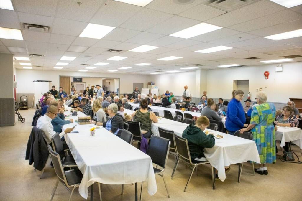‘A Seat at the Table’ offered a free turkey dinner on Oct. 8 at the Stettler Ag Society. Pictured is last year’s meal, which also drew a sizable crowd for the event. (File photo)
